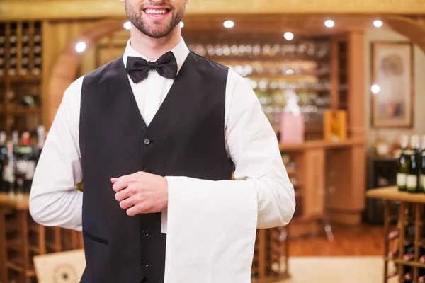 Man in waistcoat and bow tie