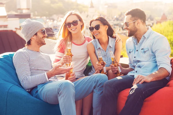 People chatting and drinking beer