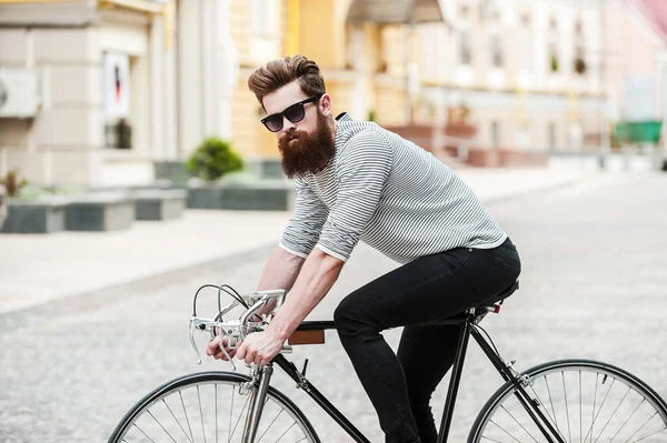 Handsome bearded man with bicycle
