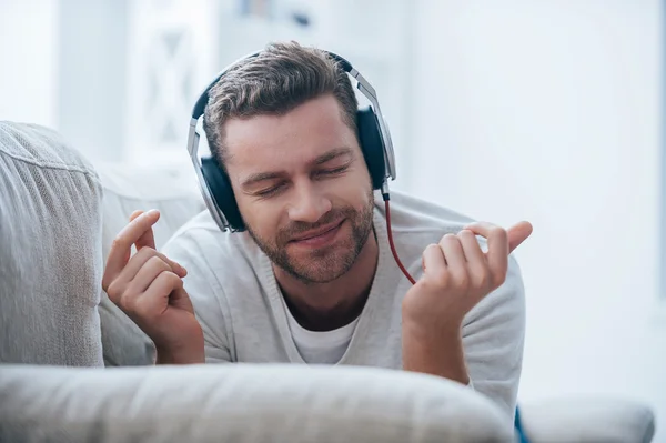 Man in headphones listening to the music