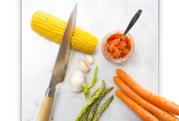 Marble cutting board with vegetables