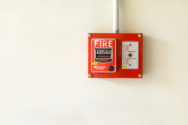 Fire alarm switch on the wall