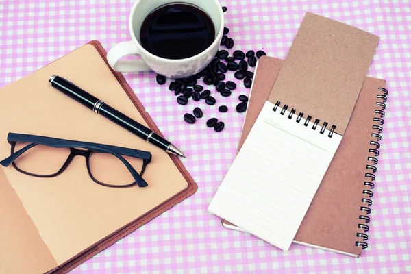 Blank note book with coffee