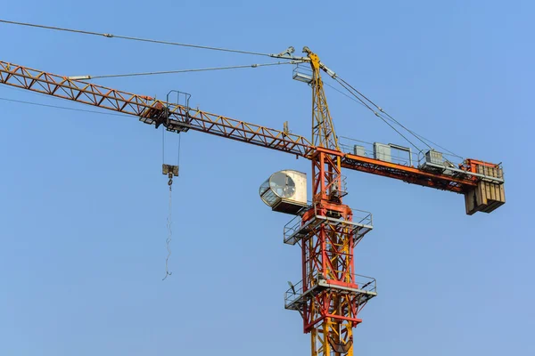 Construction cranes with blue sky