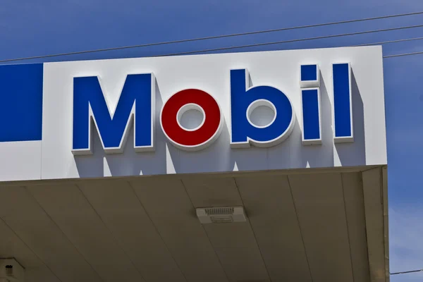 Indianapolis - Circa June 2016: Mobil Gas Station Signage. Mobil Merged with Exxon to Become ExxonMobil Traded as XOM III