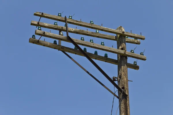 Crossarms of a Former AT&T or Bell System Telephone Pole with Antique Glass Insulators I