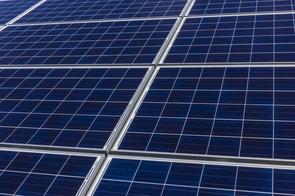 Solar Panel Farm. Corn Fields are Being Converted into Green Energy Areas Using Photovoltaic Cells IV