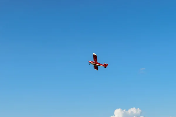 Small sport plane in air