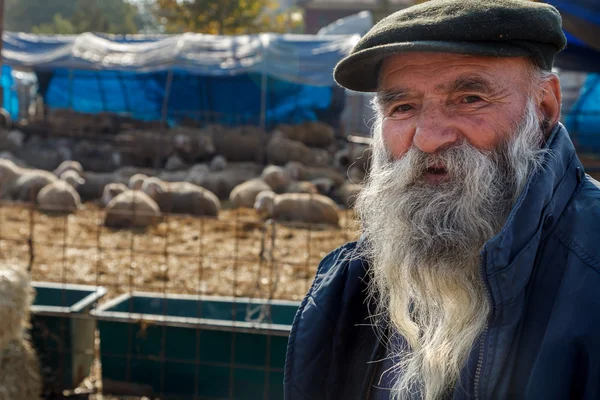 An animal dealer with his mustaches and beard