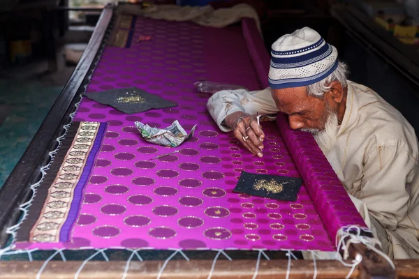 Hand made scarf and sari producers