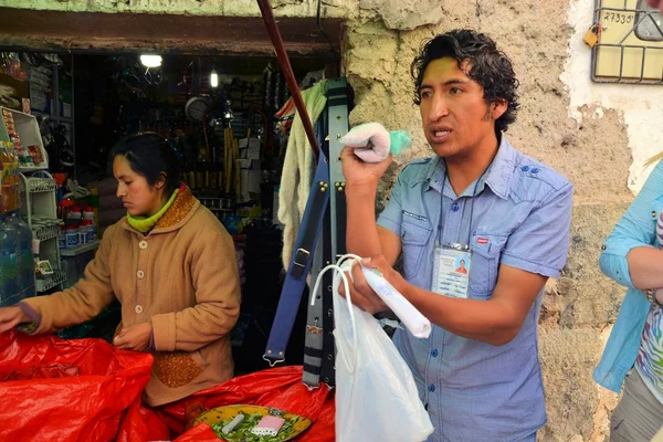 Dynamite is sold at the miners market in Potosi, Bolivia