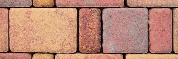 Paving blocks made of colored stones