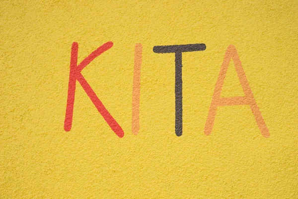 German word Kita on the wall