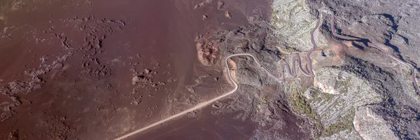 Aerial photo of Road in volcanic landscape of Plaine des Sables, Reunion Island