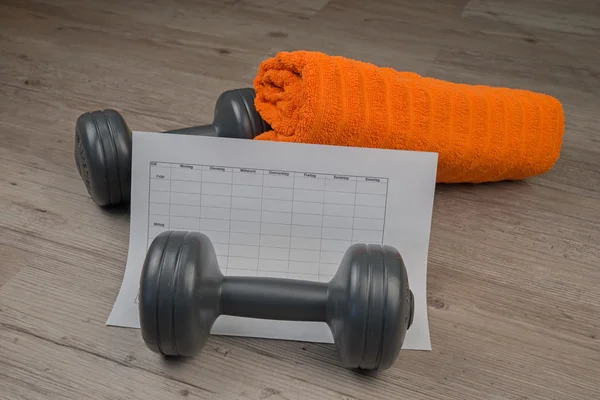 Dumbbell and towel with Workout plan