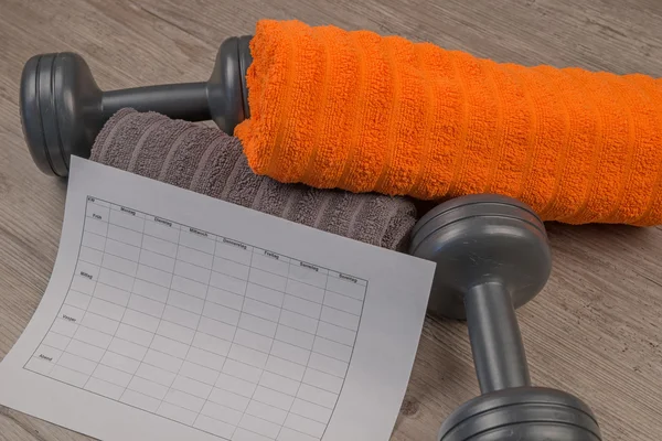 Dumbbell and towel with Workout plan