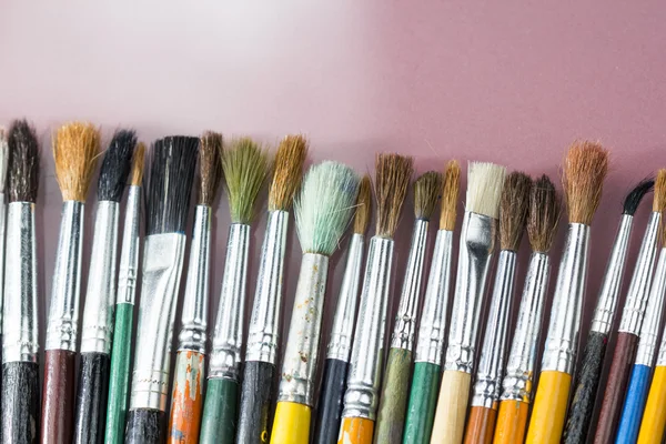 Set of different paintbrushes with white background