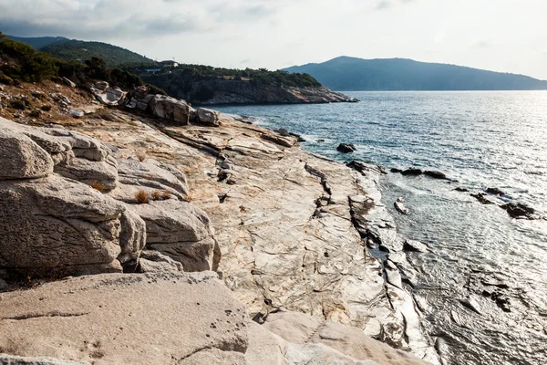 Aegean seashore and marble rocks in Aliki, Thassos island