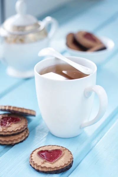 Morning tea cup with cookies