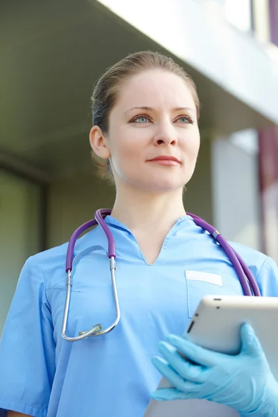 Female doctor with tablet pc