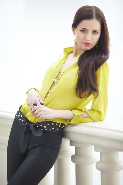 Beautiful woman in yellow blouse