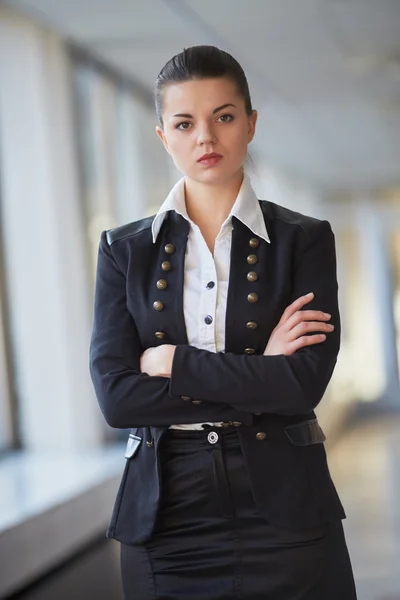 Businesswoman in office hallway