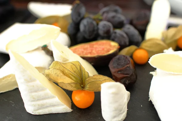 Cheese, olives, berries, sauces, snacks