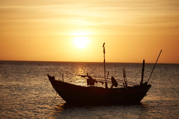 Fishing boat at sunset