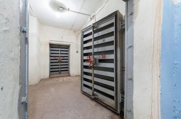 Heavy steel door in the bomb shelter