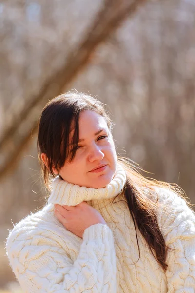 Beautiful woman in spring forest