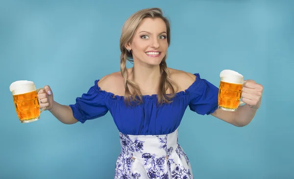 Funny girl with pigtails and glasses of beer