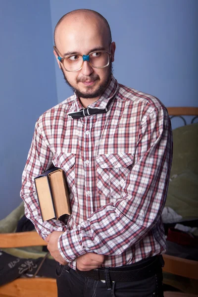 Funny nerd with books