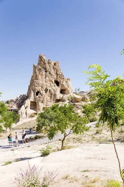 CAPPADOCIA, TURKEY - JUN 25, 2014: Photo of cave monastery complex at the Open Air Museum of Goreme. Rock with caves - ruins of Nunnery , XI century.