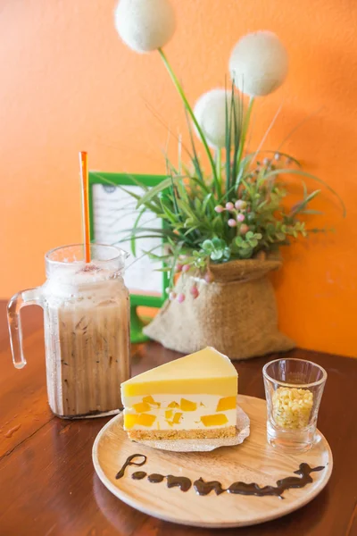Mango mousse cake and ice coffee