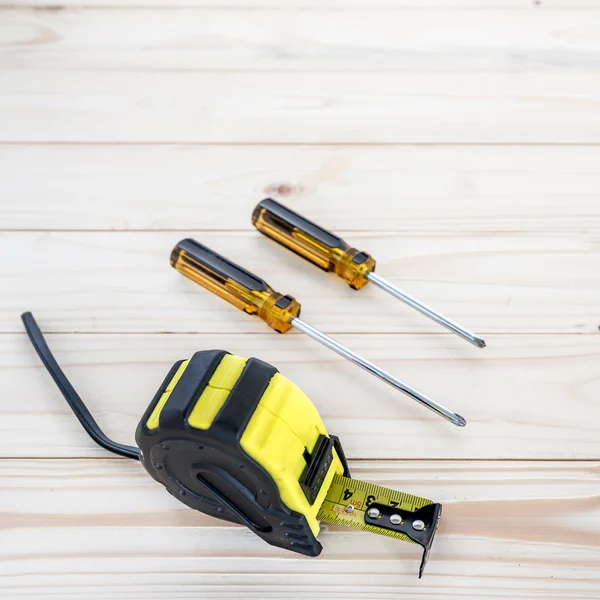 Tape measure and phillips screw driver