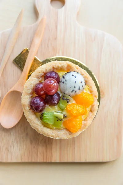 Fresh homemade fruit tart with orange