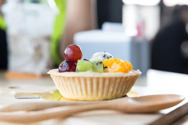 Fruits tarts on wooden table