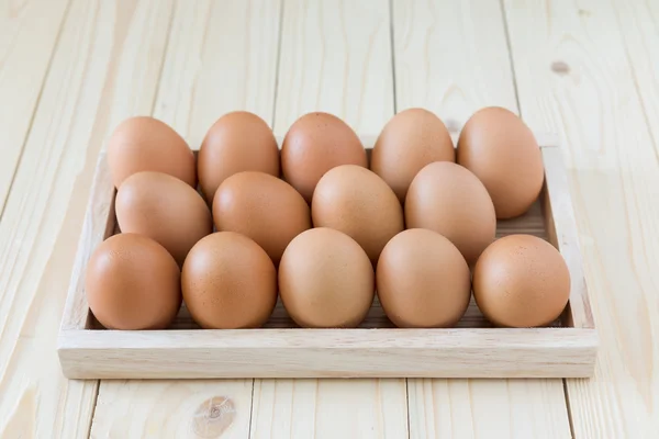 Chicken eggs in wood box