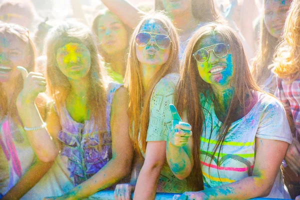 VITEBSK, BELARUS - JULY 4, 2015. Happy people at the Holi color festival