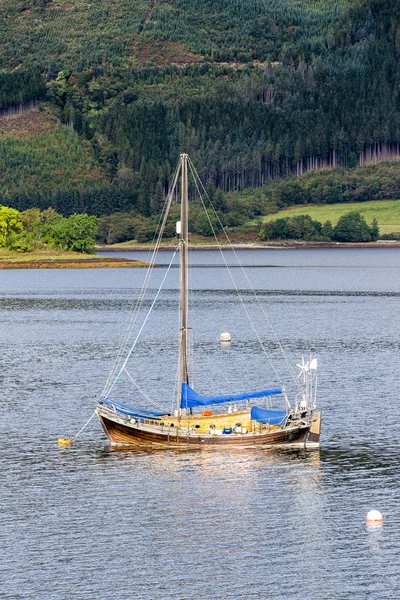 Portrait of an anchored sailboat at Glencoe