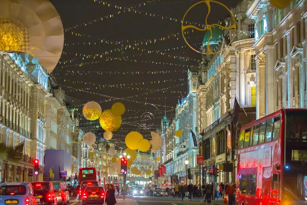 Christmas lights decoration at Oxford street and lots of people walking during the Christmas sale, London