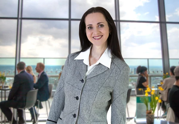 Attractive business woman portrait in the office. Business and modern life concept