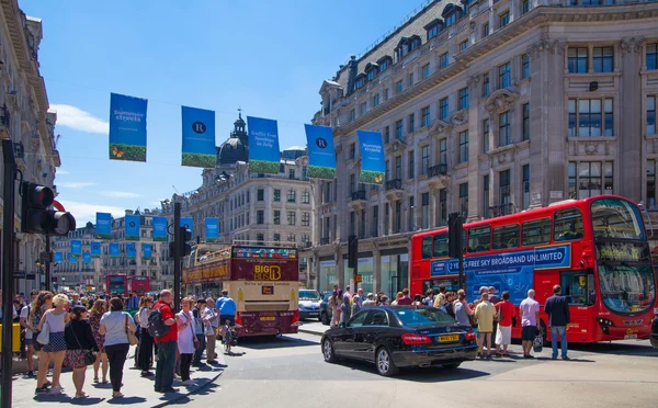 LONDON, UK - JULY 29, 2014: Regent street in London, tourists and busses