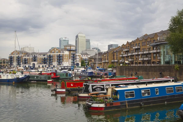 LONDON, UK - 3 JUNE 2014: Limehouse basin in the centre of London, private bay for boats and yatches and flats with Canary Wharf view