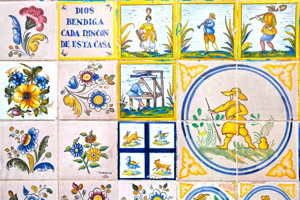 Decorative tiles on Madrid street. National decorative art with agricultural symbols