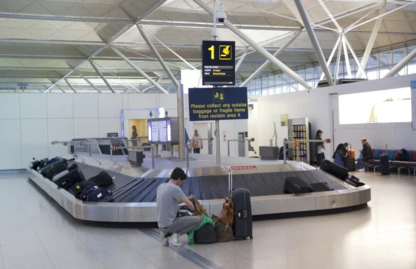 Stansted airport,  luggage waiting aria