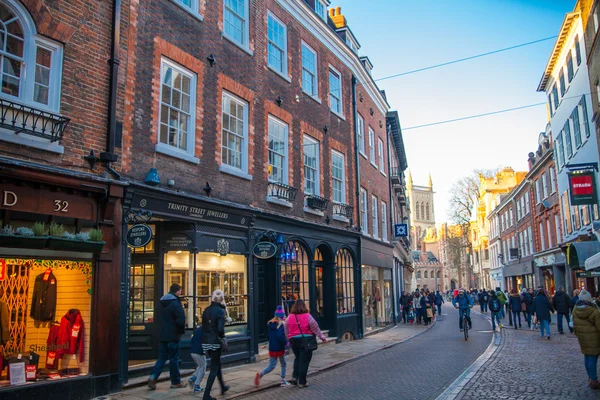 Trinity street with lots of shops and cafes, Cambridge