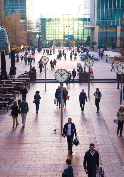 LONDON, UK - NOVEMBER 29, 2014: Canary Wharf square with lots of office workers