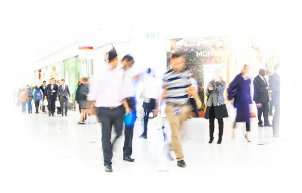 Business people moving blur. People walking in rush hour. Business and modern life concept