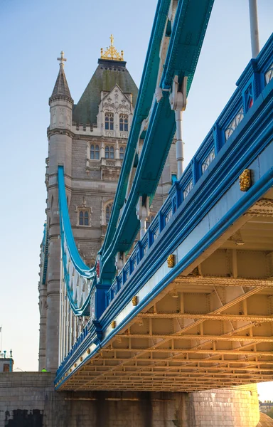 LONDON, UK - APRIL15, 2015: Tower bridge in sunset. City of London, south bank of river Thames walk.